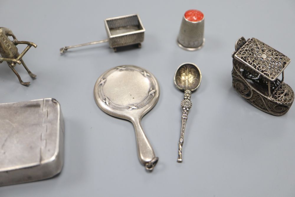 A George III curved silver snuff box, makers mark IP, Birmingham 1813, 5.7 cm, and other small silver or plated objects of vertu